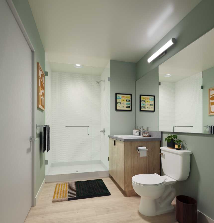 A bathroom with green walls