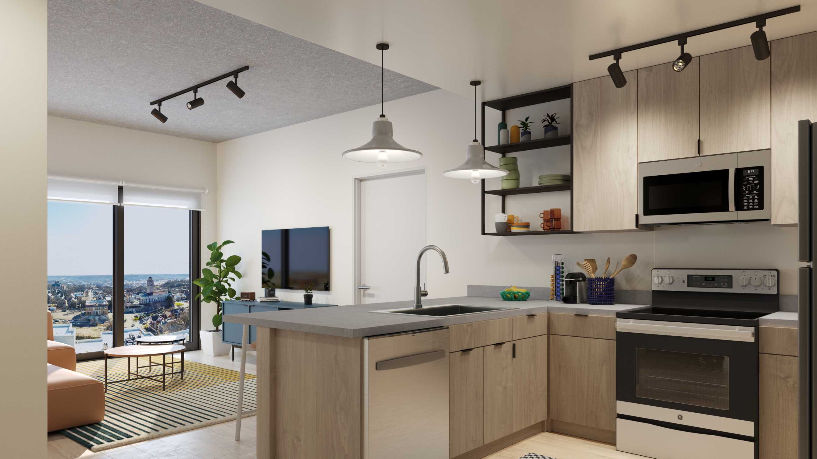 A kitchen with light brown cabinets