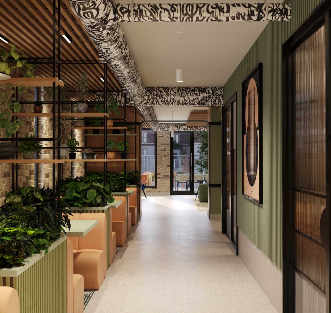 A lobby hallway with green walls