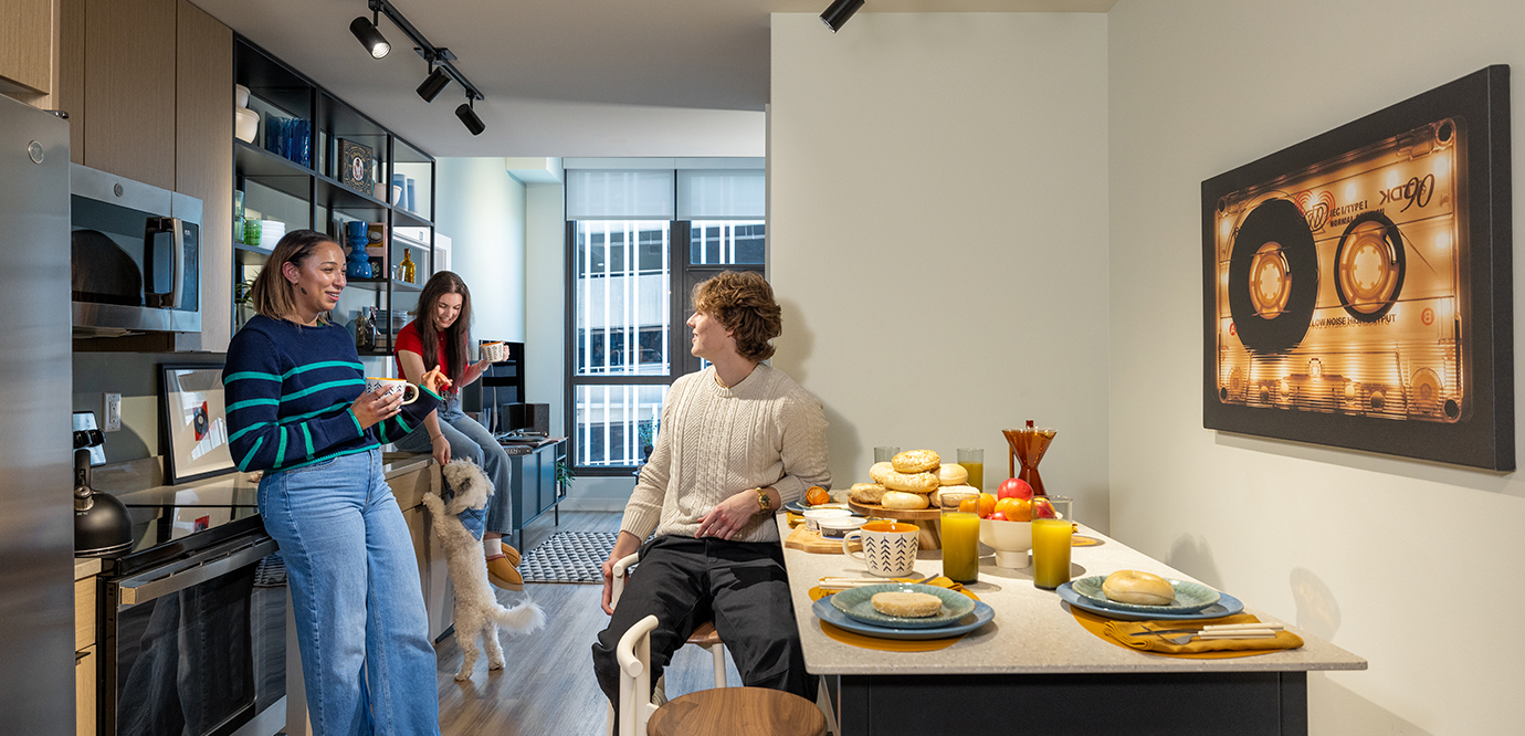 friends in an apartment kitchen